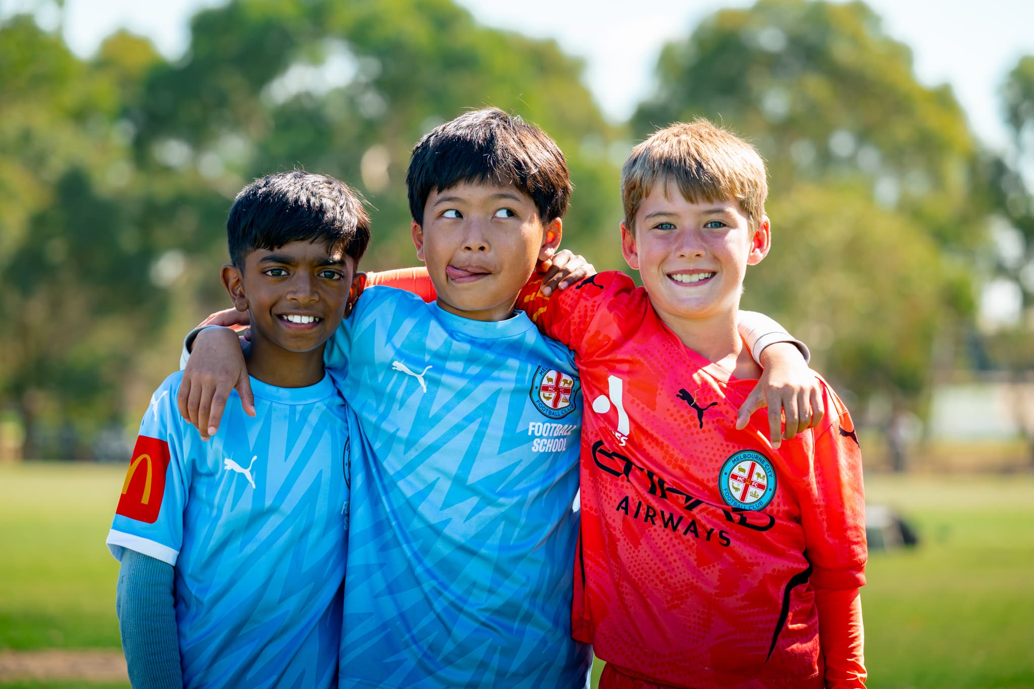 Young football players enjoying training together.